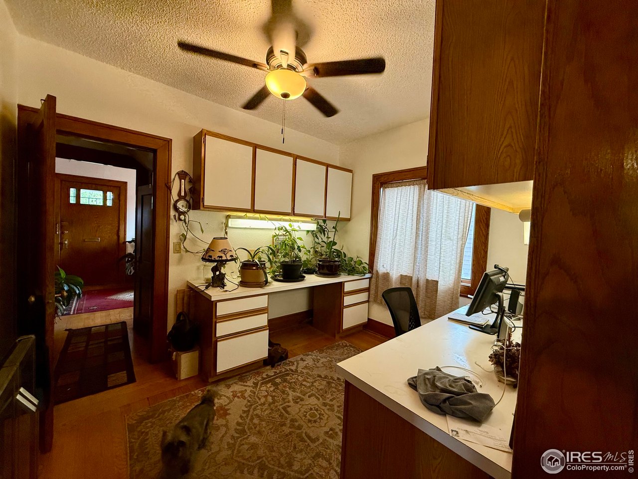 406 South Morlan Avenue Holyoke, CO 80734 - Photo 10 of 38 a living room with furniture and a large window
