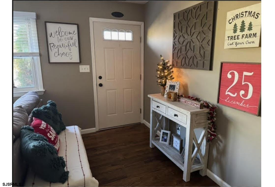 6936 Casale Boulevard Mays Landing, NJ 08330 - Photo 2 of 9 a view of an entryway with furniture and toys