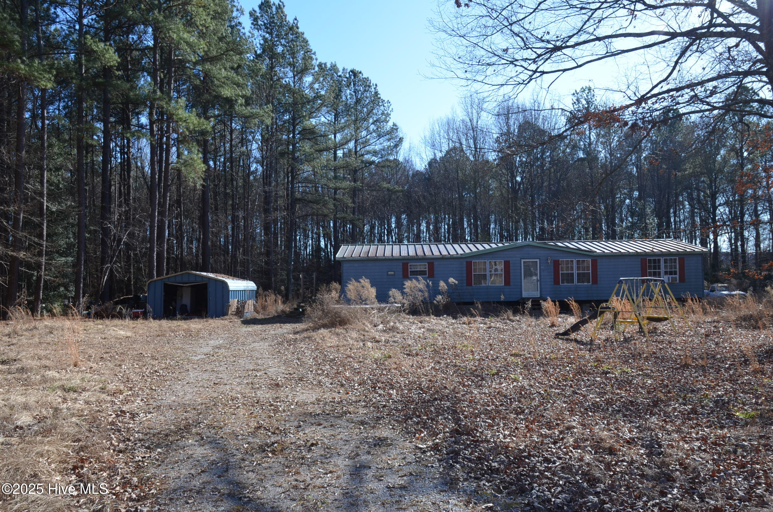 8097 Bray Road Bailey, NC 27807 - Photo 3 of 9 Showing doublewide on property with no value on 6.73 Acres