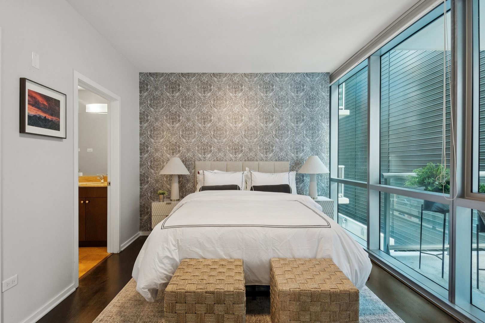 125 South Green Street, Unit 308A Chicago, IL 60607 - Photo 12 of 24 a bed sitting in a bedroom next to a window