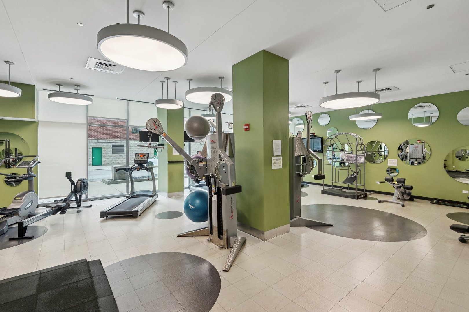 125 South Green Street, Unit 308A Chicago, IL 60607 - Photo 23 of 24 a view of a room with gym equipment