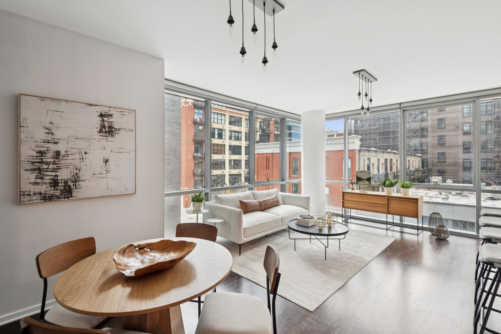 125 South Green Street, Unit 308A Chicago, IL 60607 - Photo 3 of 24 a living room with furniture and a large window
