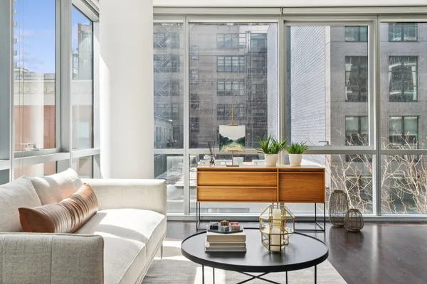 a living room with furniture and a table