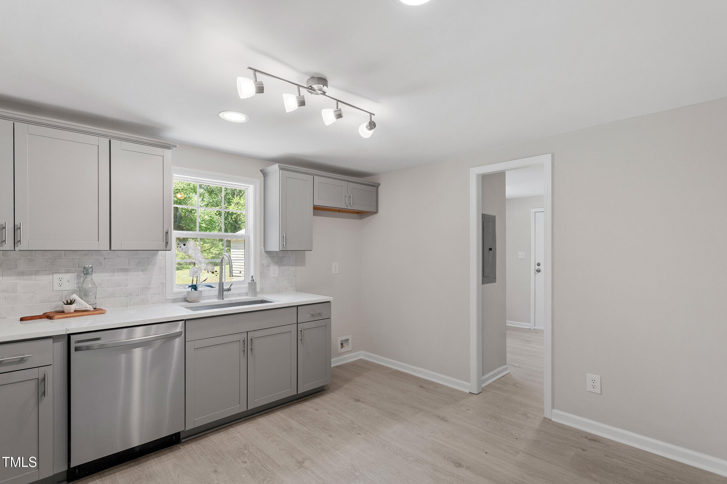 5049 West Hornes Church Road Bailey, NC 27807 - Photo 14 of 27 a kitchen with a sink cabinets and window