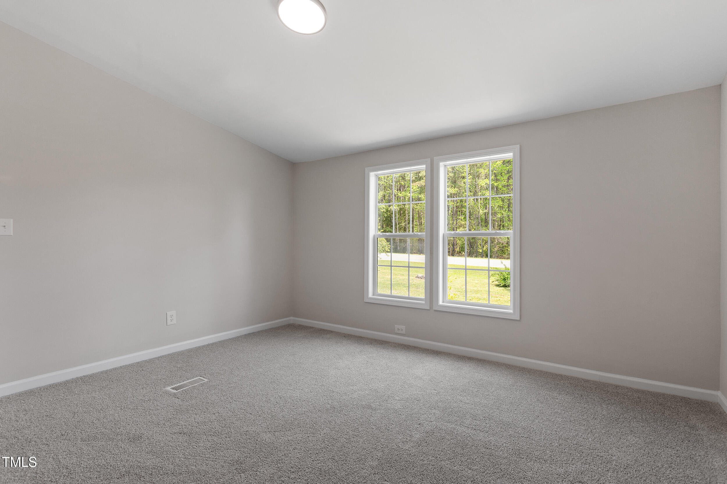 5049 West Hornes Church Road Bailey, NC 27807 - Photo 16 of 27 an empty room with a window