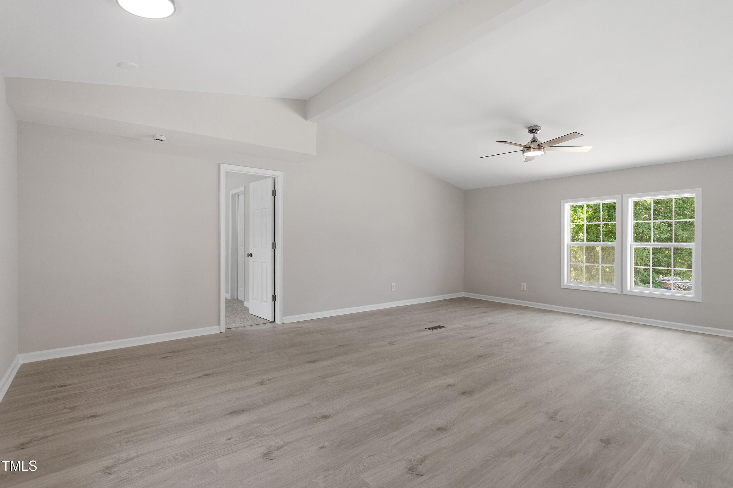 5049 West Hornes Church Road Bailey, NC 27807 - Photo 3 of 27 wooden floor in an empty room with a window