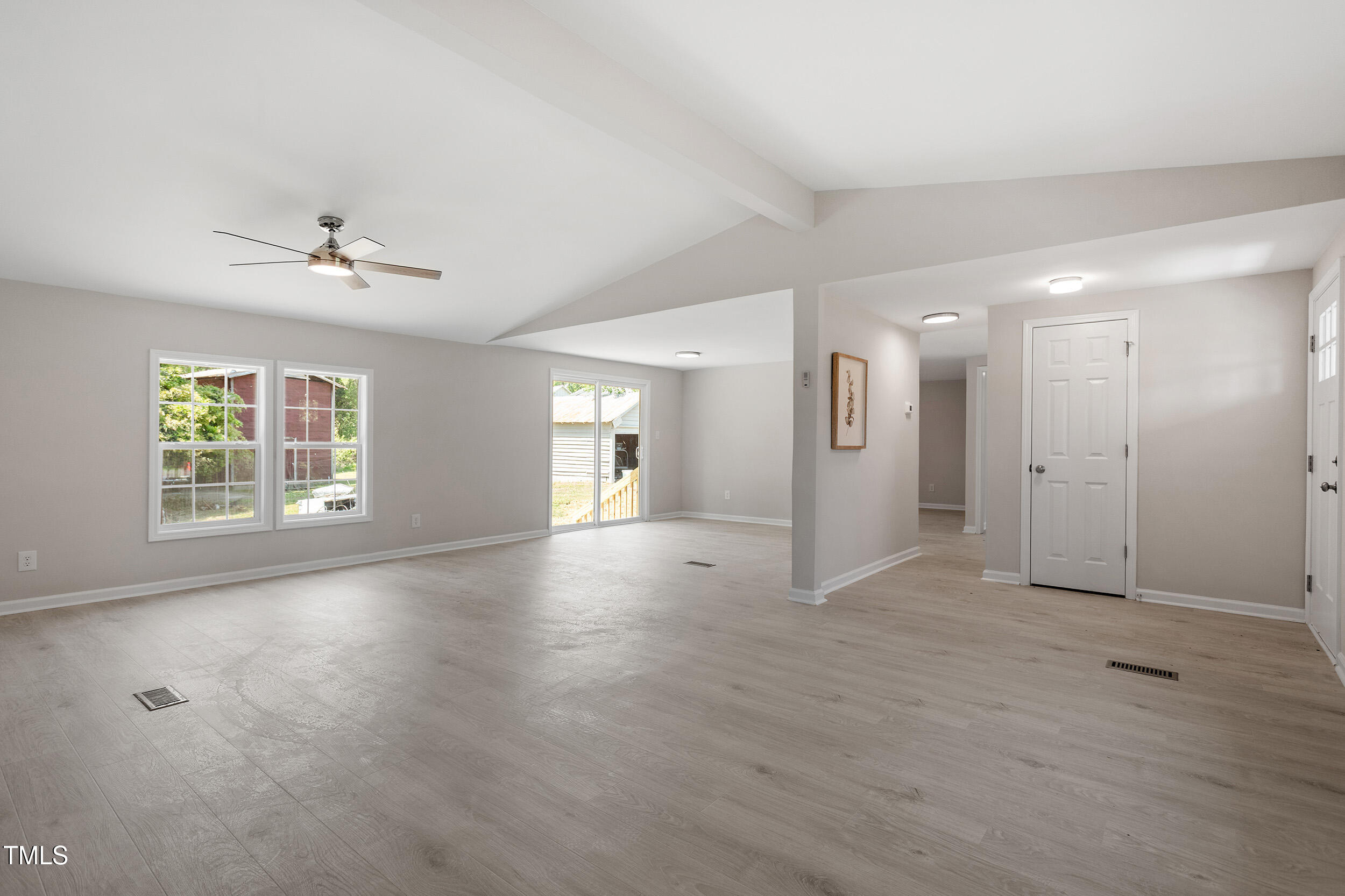 5049 West Hornes Church Road Bailey, NC 27807 - Photo 4 of 27 wooden floor in an empty room with a window
