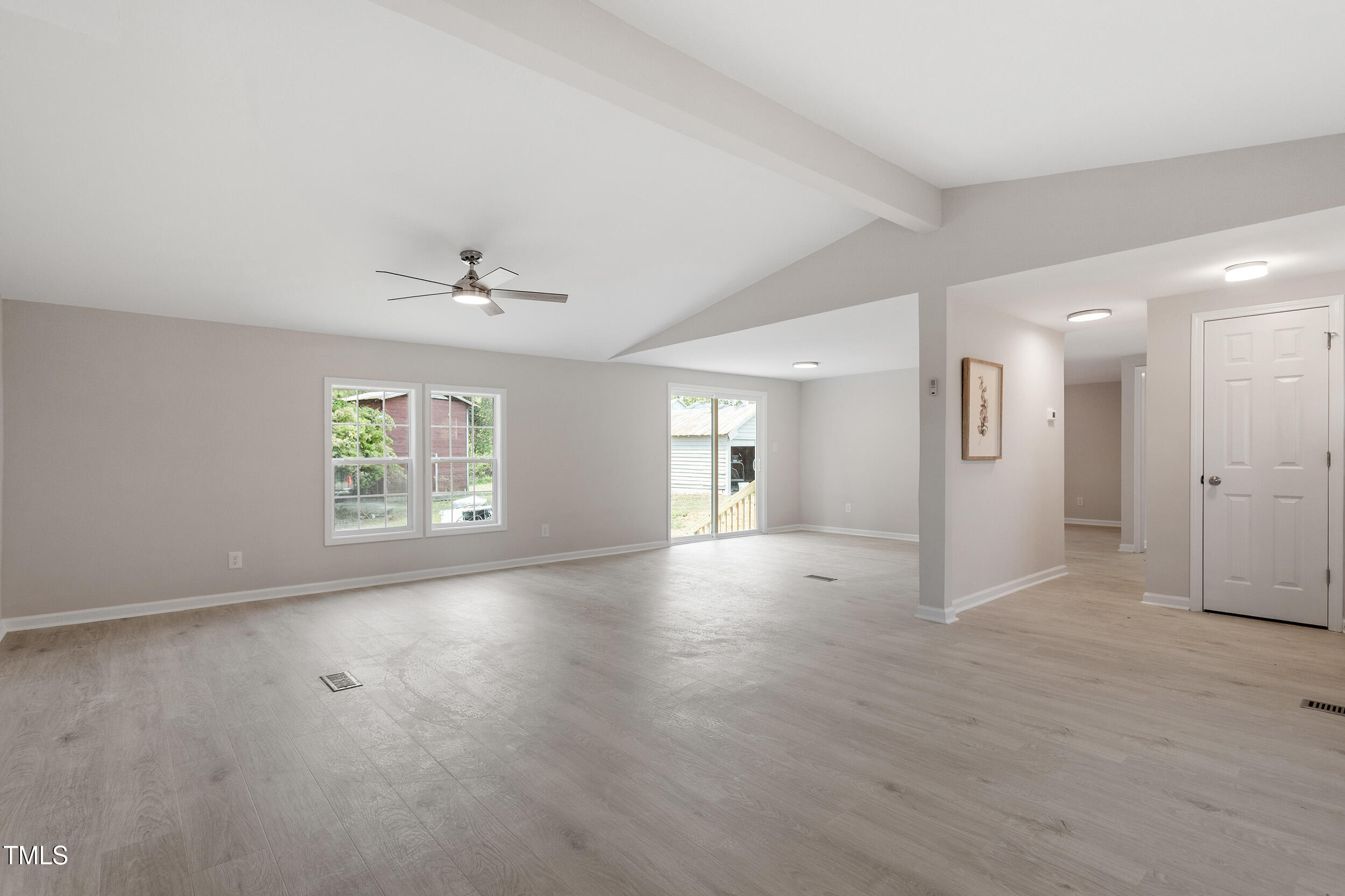 5049 West Hornes Church Road Bailey, NC 27807 - Photo 5 of 27 wooden floor in an empty room with a window