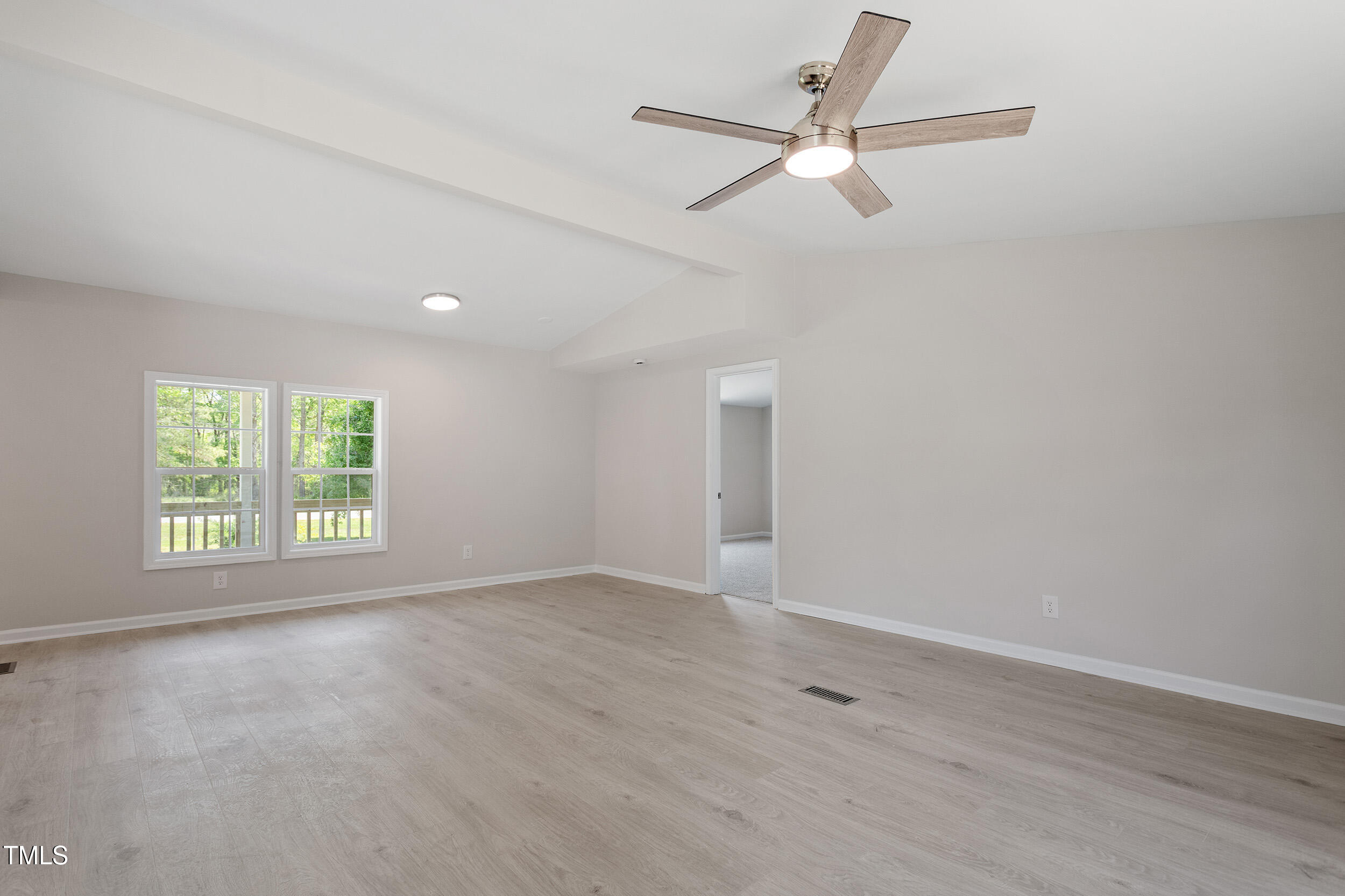 5049 West Hornes Church Road Bailey, NC 27807 - Photo 8 of 27 a view of an empty room with a window