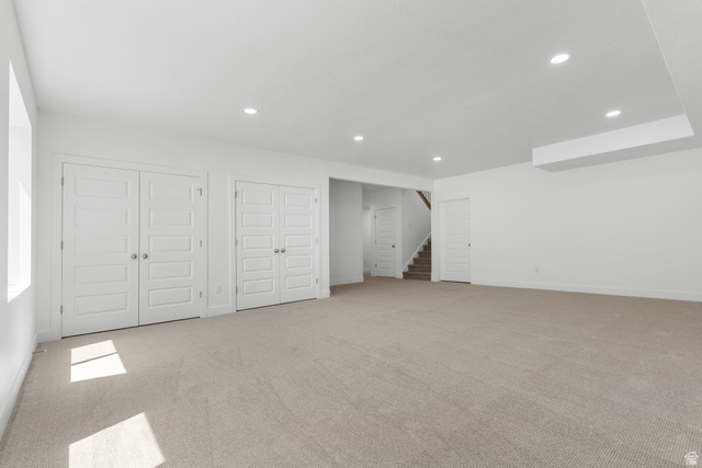 43 South Crimson Way, Unit 311 Mapleton, UT 84664 - Photo 19 of 28 Spacious room featuring light-colored carpeting, recessed lighting, and multiple paneled doors