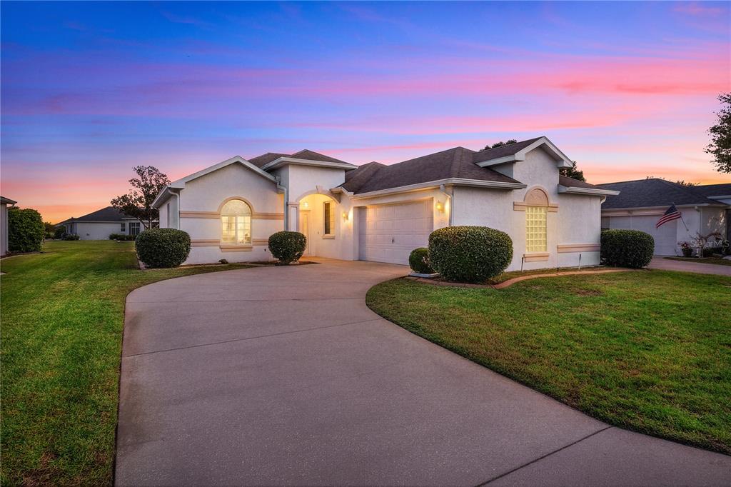 a house view with a garden space