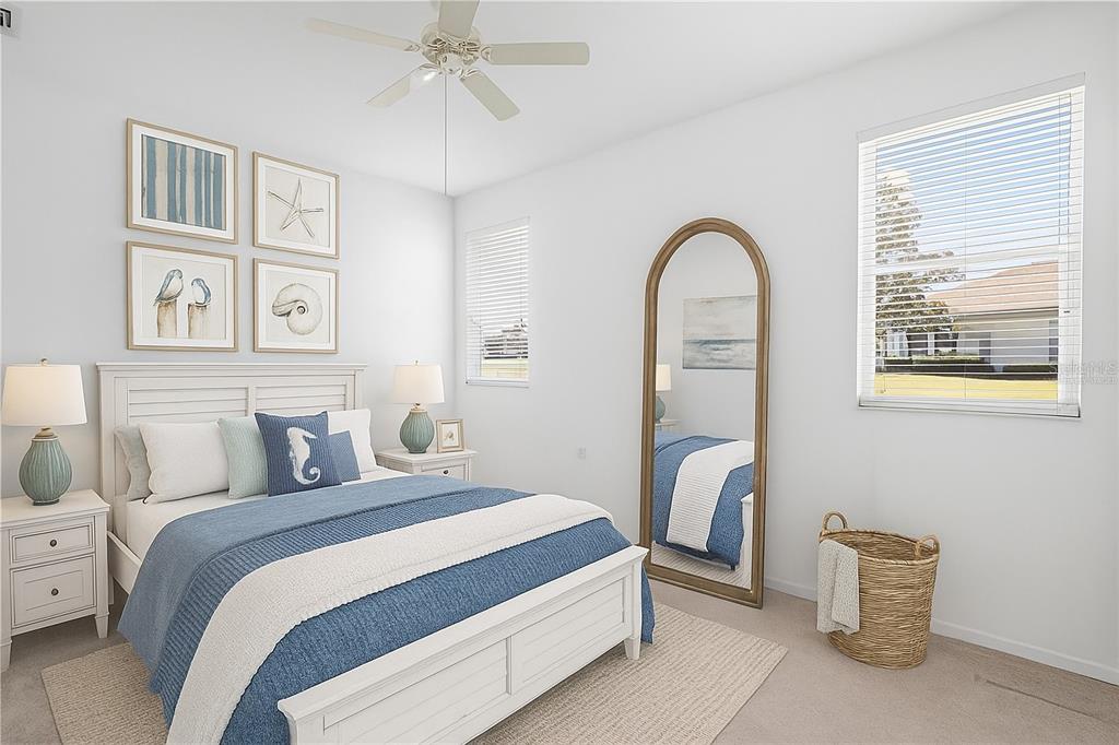 2459 Northwest 55th Avenue Road Ocala, FL 34482 - Photo 17 of 38 a bedroom with a bed and a large window
