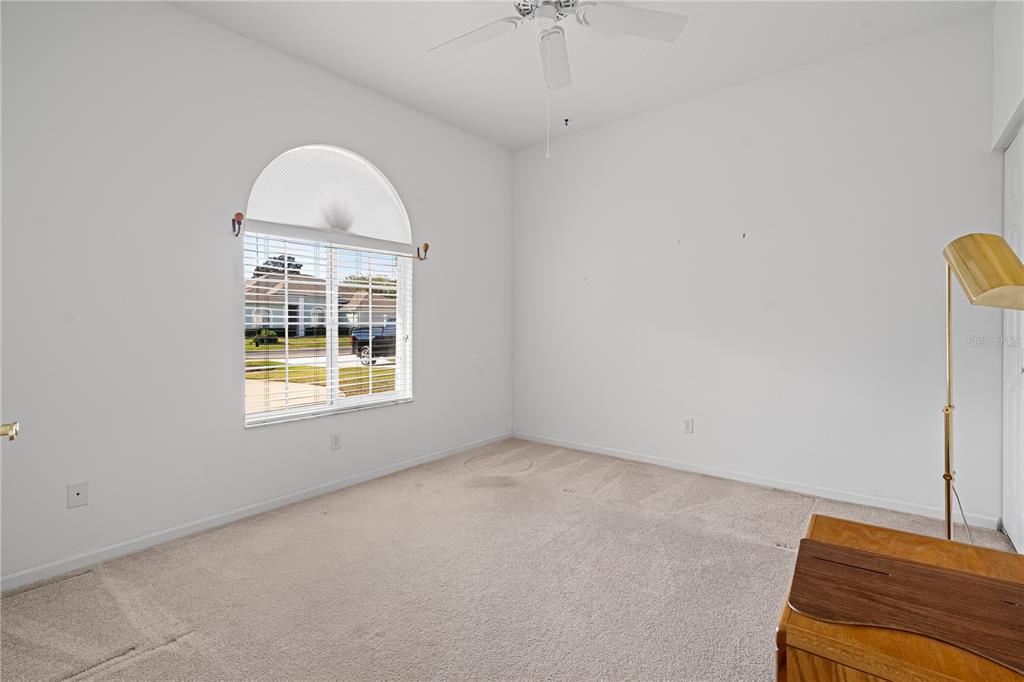 2459 Northwest 55th Avenue Road Ocala, FL 34482 - Photo 21 of 38 an empty room with windows