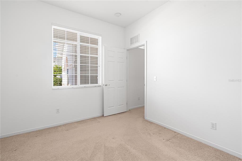 2459 Northwest 55th Avenue Road Ocala, FL 34482 - Photo 24 of 38 a view of empty room with windows