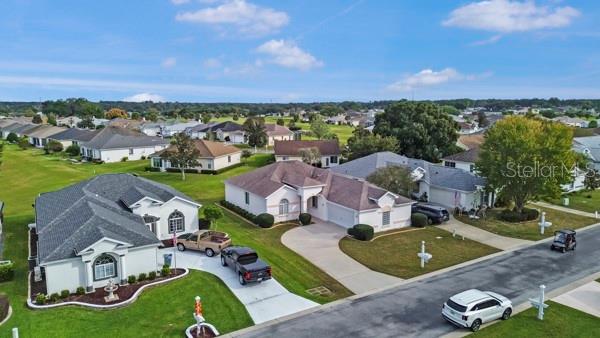 2459 Northwest 55th Avenue Road Ocala, FL 34482 - Photo 36 of 38 an aerial view of residential houses with outdoor space and trees