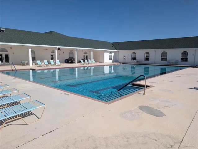 a view of a chairs and table on the terrace