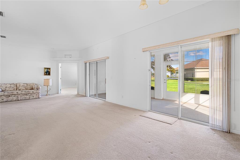 2459 Northwest 55th Avenue Road Ocala, FL 34482 - Photo 8 of 38 a view of livingroom with natural light