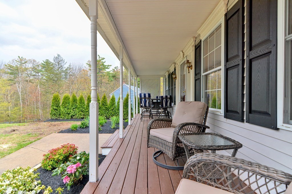 494 S Road Templeton, MA 01468 - Photo 3 of 34 a view of balcony with furniture and garden