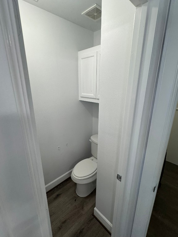 2710 Hullsmith Drive, Unit 701 Houston, TX 77063 - Photo 14 of 19 a bathroom with a toilet and a sink