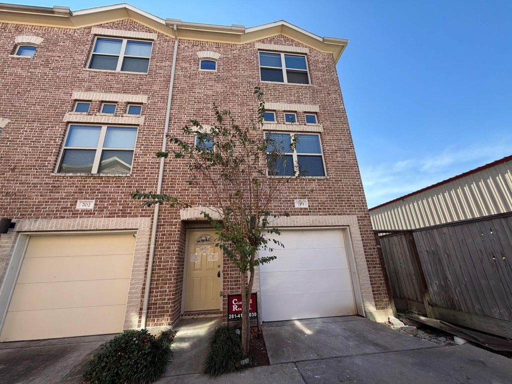 2710 Hullsmith Drive, Unit 701 Houston, TX 77063 - Photo 2 of 19 a front view of a house