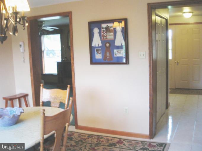 28731 Kemptown Road Mount Airy, MD 21771 - Photo 20 of 30 a view of a dining room with furniture and a window
