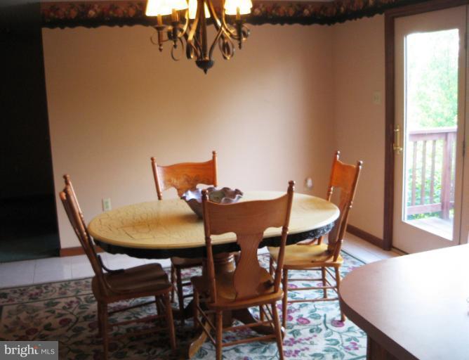 28731 Kemptown Road Mount Airy, MD 21771 - Photo 8 of 30 a view of a dining room with furniture and window