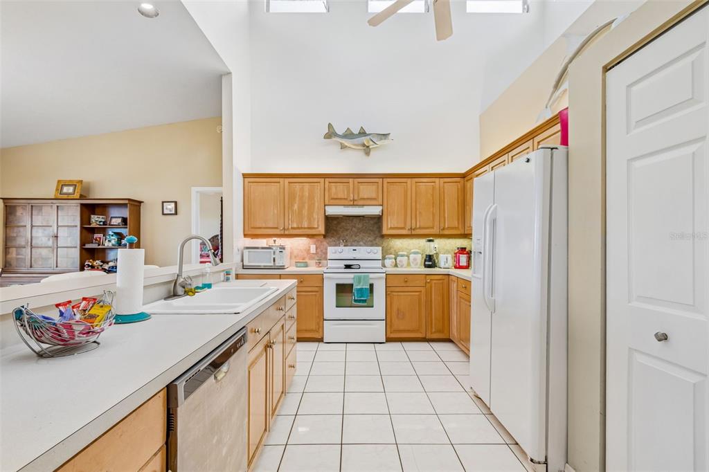 119 Burns Road Terra Ceia, FL 34250 - Photo 17 of 100 a kitchen with a sink appliances and cabinets