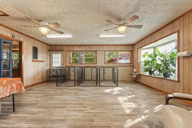 a view of an empty room with a window