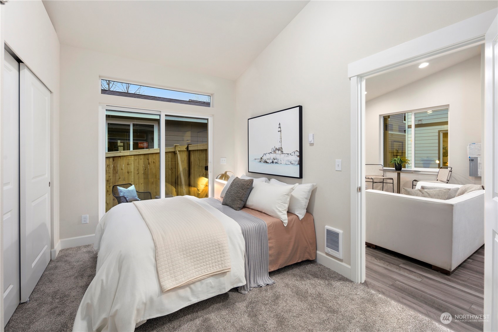 10981 Southeast 165th Street Renton, WA 98055 - Photo 34 of 38 a bedroom with a large bed and a large window