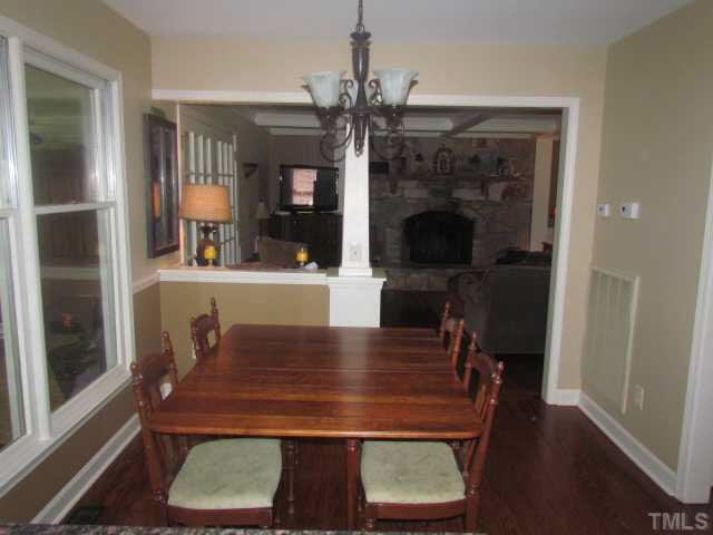 356 Shiloh Church Road Roxboro, NC 27574 - Photo 11 of 24 a view of a dining room with furniture and wooden floor