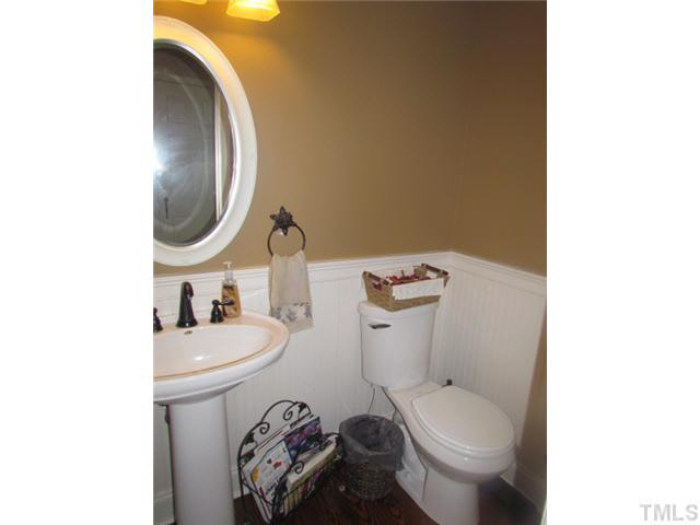 356 Shiloh Church Road Roxboro, NC 27574 - Photo 12 of 24 a bathroom with a toilet and a mirror