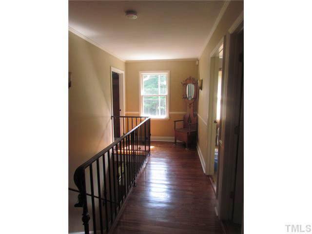 356 Shiloh Church Road Roxboro, NC 27574 - Photo 13 of 24 a view of a hallway with wooden floor and entryway