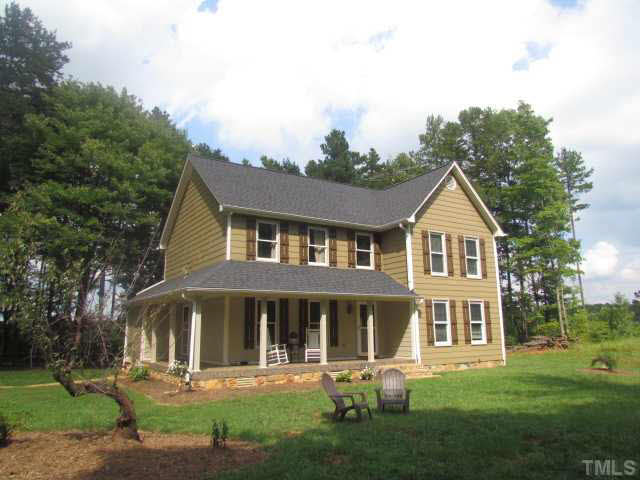 356 Shiloh Church Road Roxboro, NC 27574 - Photo 24 of 24 a front view of a house with a yard