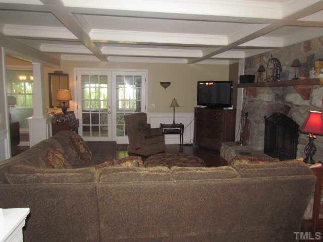 356 Shiloh Church Road Roxboro, NC 27574 - Photo 3 of 24 a living room with furniture and a flat screen tv