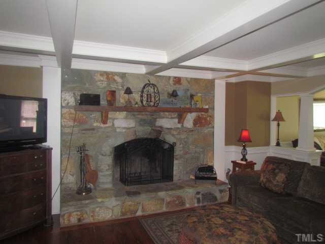356 Shiloh Church Road Roxboro, NC 27574 - Photo 5 of 24 a living room with furniture and a fireplace
