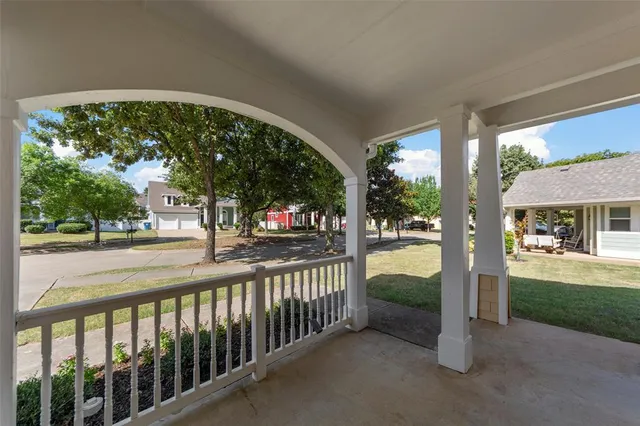 a view of a street from a balcony