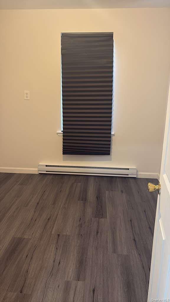 17 Dillon Road Monticello, NY 12701 - Photo 8 of 17 an empty room with wooden floor