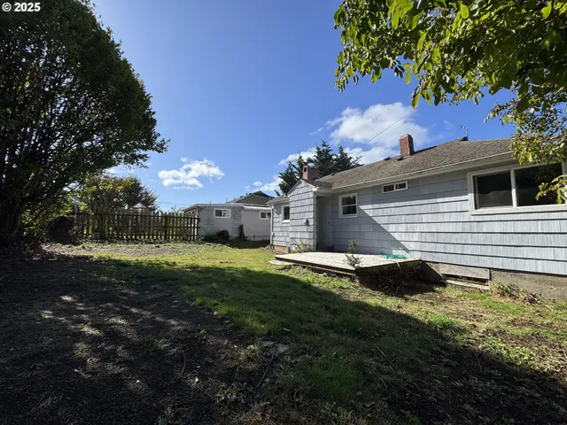 a backyard of a house with lots of green space