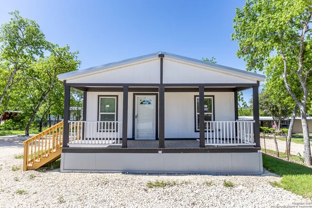 a view of a house with a deck