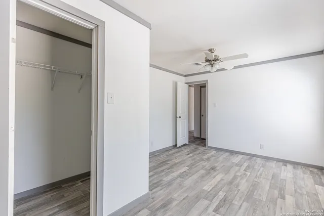 a view of entryway with wooden floor
