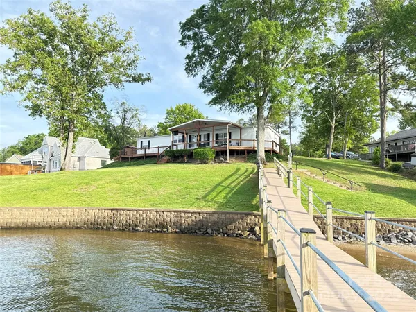 a view of a lake with a house