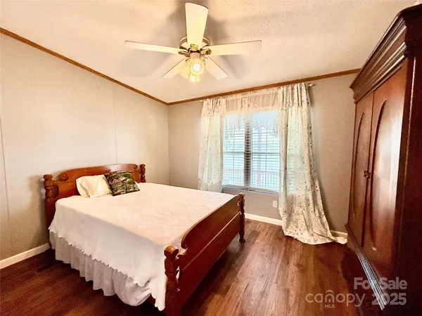 a view of a porch with wooden floor