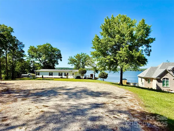 a house with trees in the background