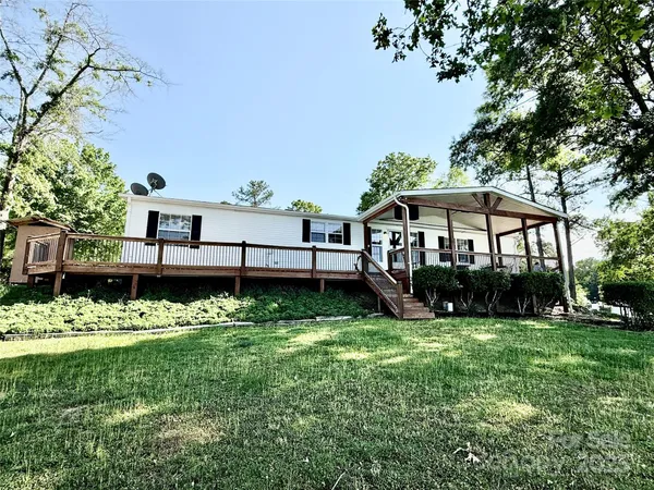 a view of a swimming pool with a lounge chair