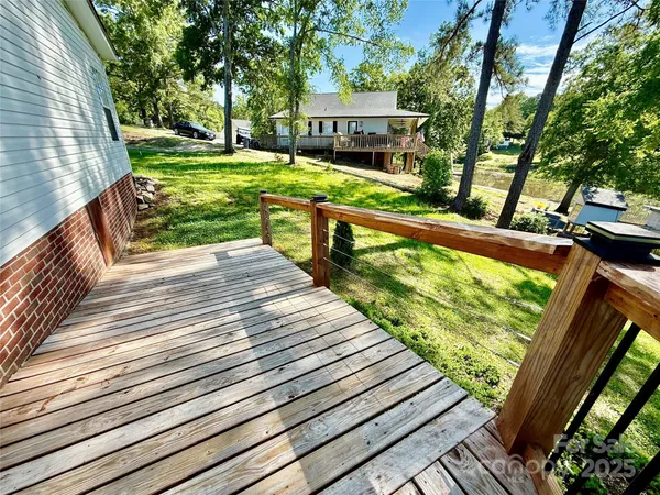 a backyard of a house with lots of green space