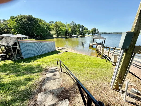 a view of a house with swimming pool
