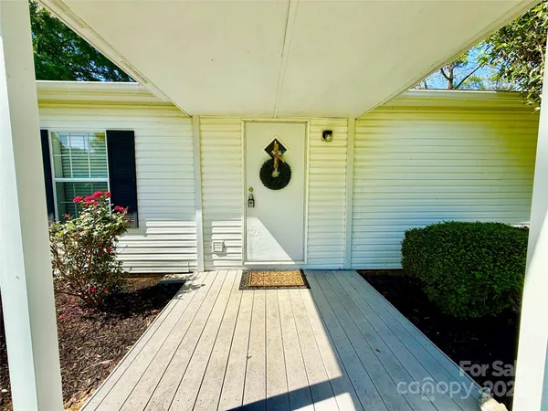 a view of a backyard with plants