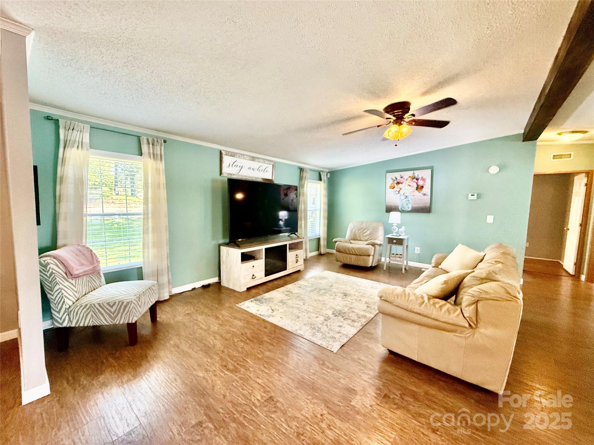 37 Suede Lane Ridgeway, SC 29130 - Photo 8 of 42 a living room with furniture and a flat screen tv