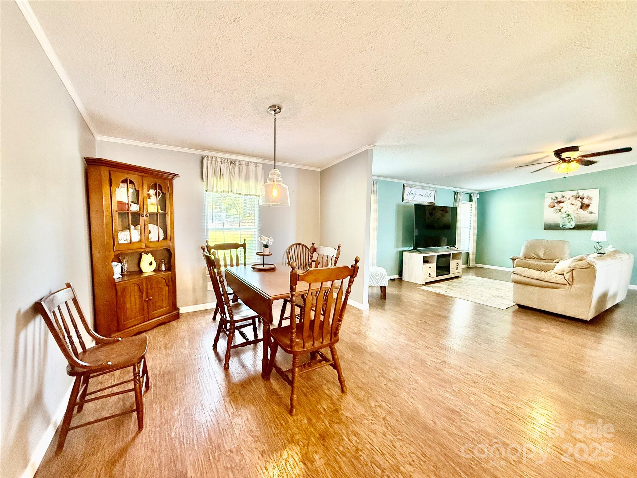 37 Suede Lane Ridgeway, SC 29130 - Photo 10 of 42 a view of a dining room with furniture and a livingroom