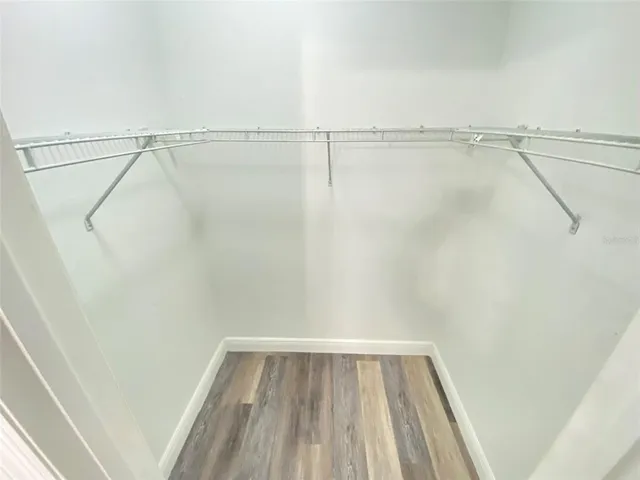 a view of a room with racks on the wall